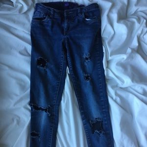 Distressed dark wash skinny jeans